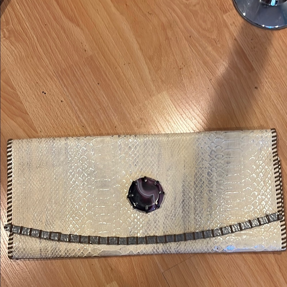 Elegant Cream Clutch with Gemstone Accent